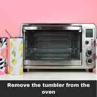 Remove the tumbler from the oven